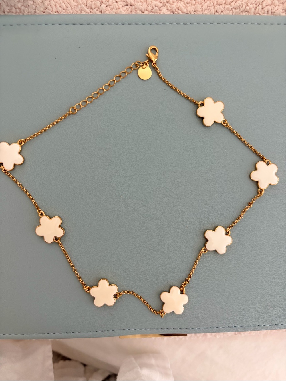 Gold-Tone Necklace with White Flower Charms